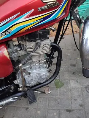 Honda 125 Motorcycle Service Manual and Original Documents