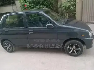 Photo - Daihatsu Cuore Compact Hatchback - Reliable Family Car