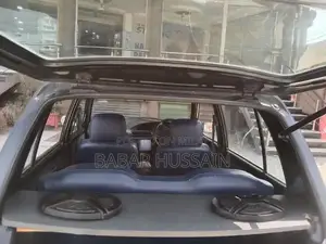 Daihatsu Cuore Compact Hatchback - Reliable Family Car