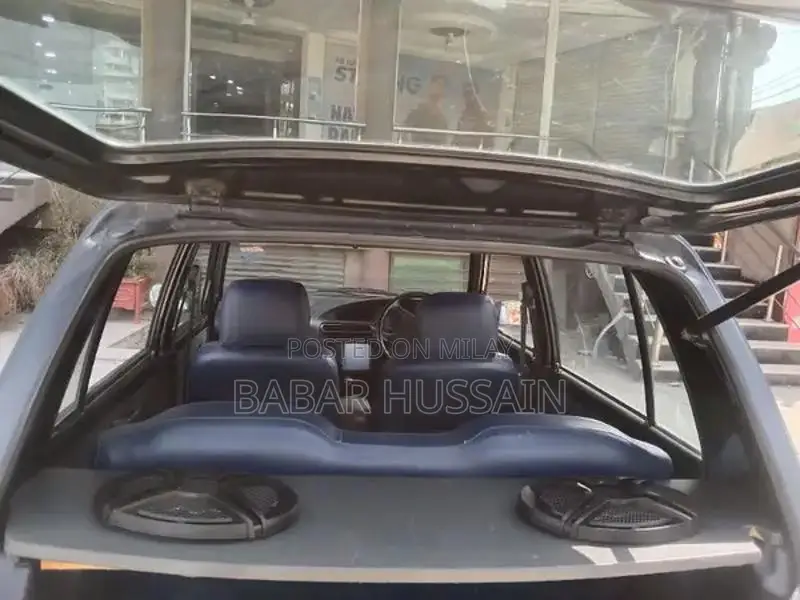 Daihatsu Cuore Compact Hatchback - Reliable Family Car