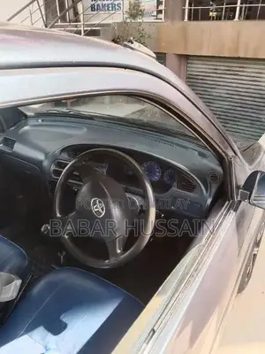 Daihatsu Cuore Compact Hatchback - Reliable Family Car