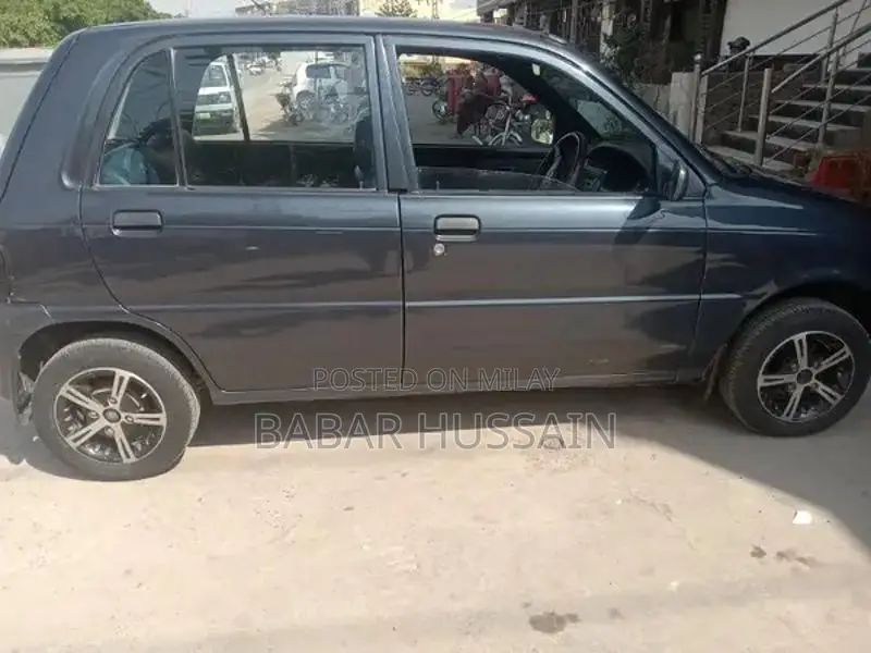 Daihatsu Cuore Compact Hatchback - Reliable Family Car