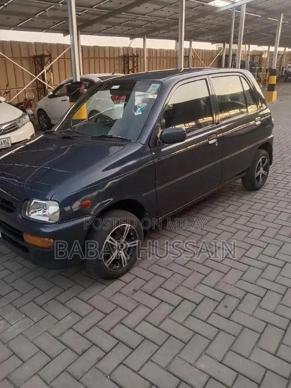 Daihatsu Cuore Compact Hatchback - Reliable Family Car