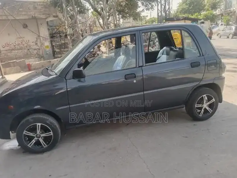 Daihatsu Cuore Compact Hatchback - Reliable Family Car