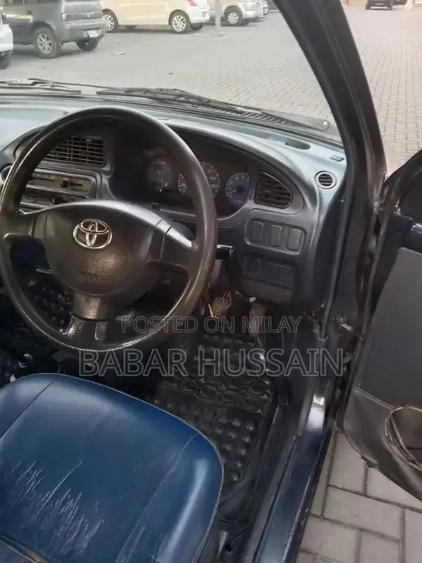 Daihatsu Cuore Compact Hatchback - Reliable Family Car