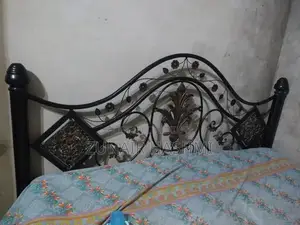 Photo - King Size Master Crest Iron Bed Frame with Spring Mattress