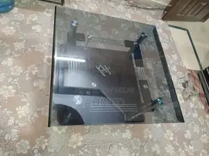 Photo - Modern Glass Coffee Table with Square Top and Simple Design