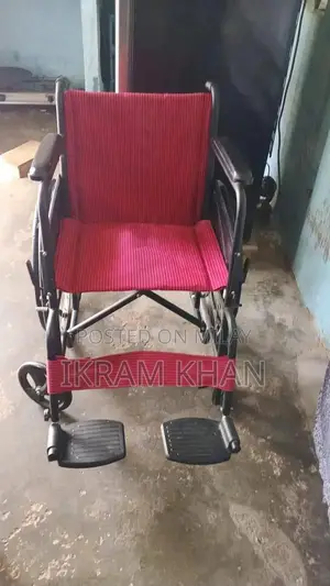 Photo - Lightweight Portable Folding Wheelchair for Easy Transport and Mobilit