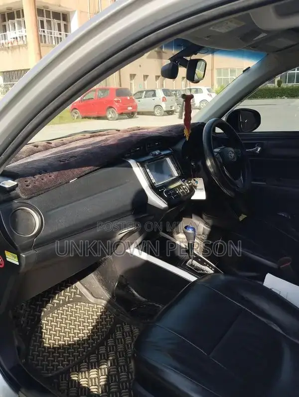 Toyota Corolla Fielder Hybrid Station Wagon - Compact Family Vehicle