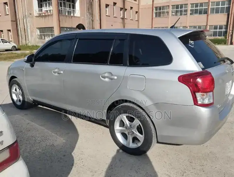 Toyota Corolla Fielder Hybrid Station Wagon - Compact Family Vehicle