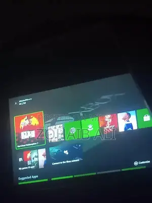 Photo - Xbox One 500GB Console with 5 Games and 2 Controllers