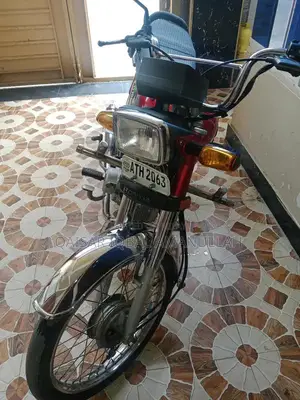 Honda 70 Motorcycle - Excellent Condition Red Bike