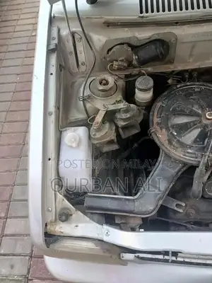 Four-Door Sedan with New Suspension and Good Condition