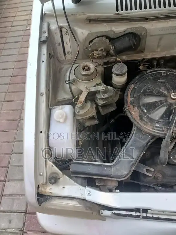 Four-Door Sedan with New Suspension and Good Condition