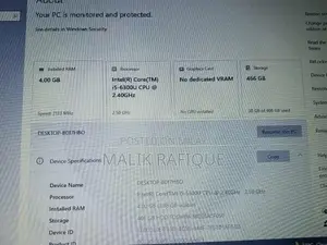 Photo - Laptop in Good Condition with Original Charger