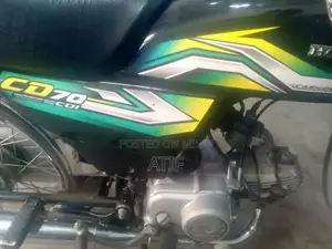 Photo - Honda CD 70 Motorcycle - Well Maintained Vintage Ride