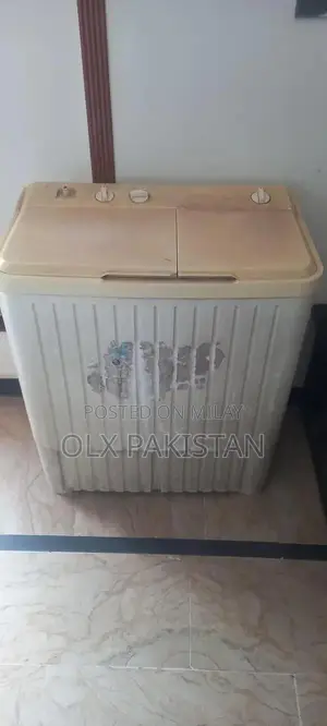 Photo - Haier Front-Load Washing Machine - Clean & Efficient Laundry Solution