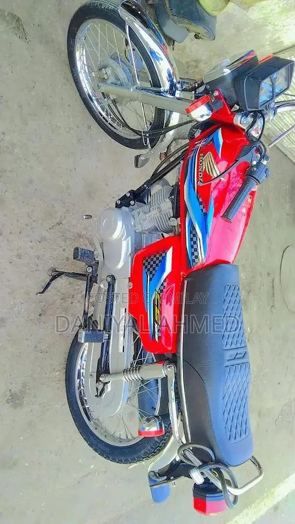 Honda 125cc Motorcycle with Golden Number 777