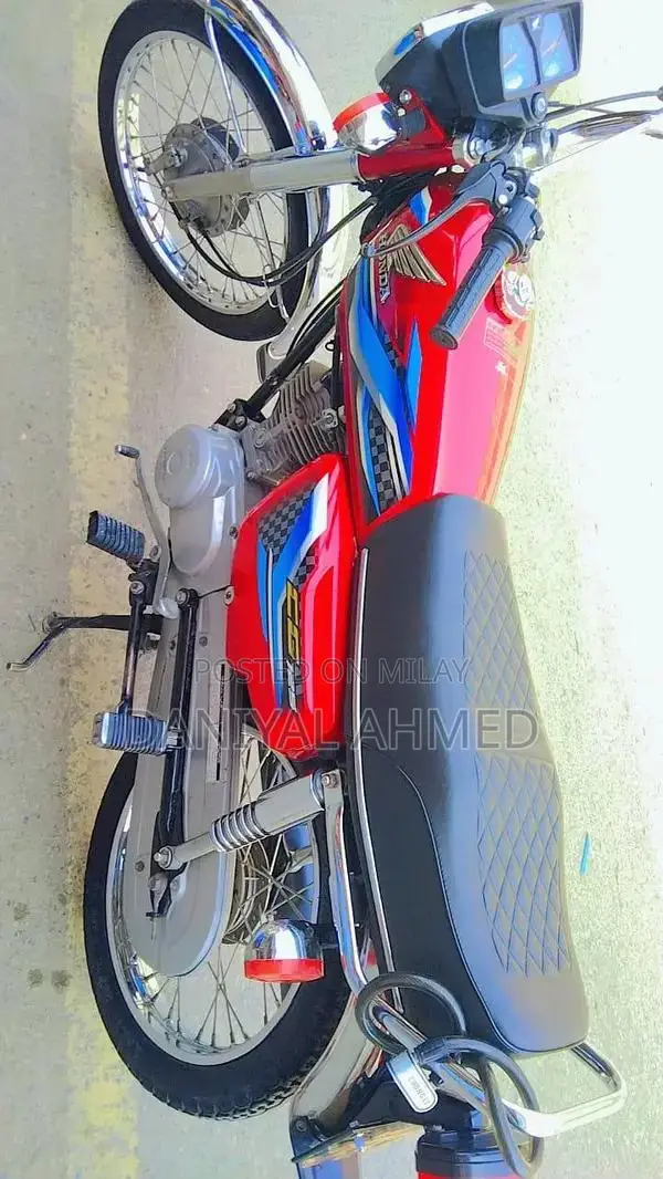 Honda 125cc Motorcycle with Golden Number 777