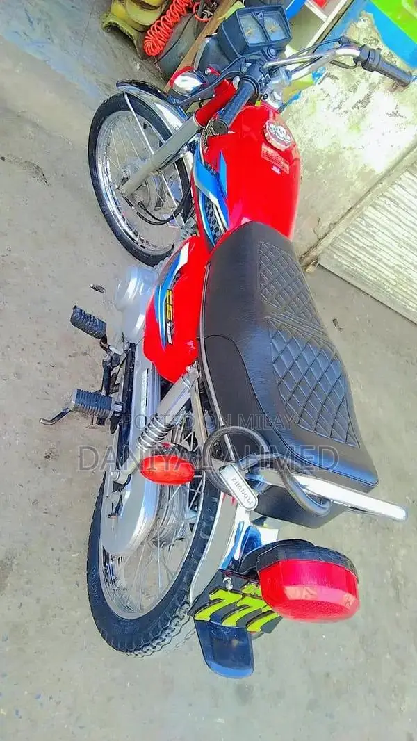 Honda 125cc Motorcycle with Golden Number 777