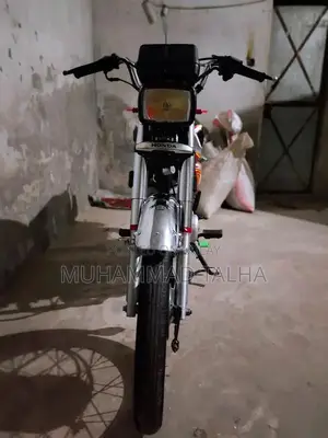 Photo - Honda 125cc Motorcycle Near-New 2022 Model Low Mileage