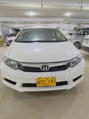 Photo - 2013 Honda Civic Triborn Sedan with Low Mileage