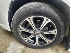 Photo - 15-Inch Honda Alloy Rims with Good Year 195/65 R15 Tires