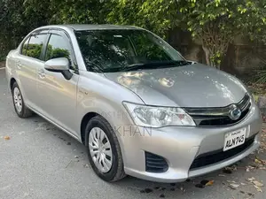 Photo - Toyota Axio Hybrid Sedan - 2015 Model with 2019 Import