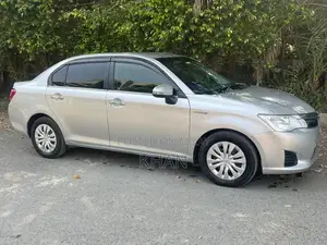 Toyota Axio Hybrid Sedan - 2015 Model with 2019 Import