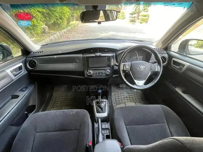 Toyota Axio Hybrid Sedan - 2015 Model with 2019 Import