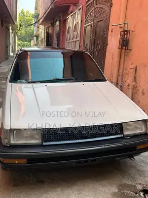 Photo - Toyota Corolla 86 Sedan - Classic Reliable Vehicle