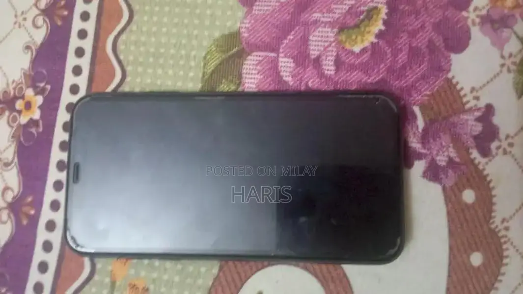 iPhone 11 Smartphone with Face ID and Water Resistance