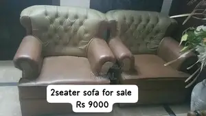 Photo - Two Sofa Sets - Black and White, Brown Colors