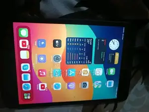 Photo - Apple iPad Mini 5 Tablet - Gaming and Productivity Device