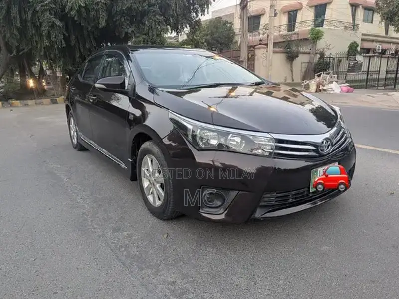 Toyota Corolla Altis Grande Sedan - Elegant Red Wine Luxury Model