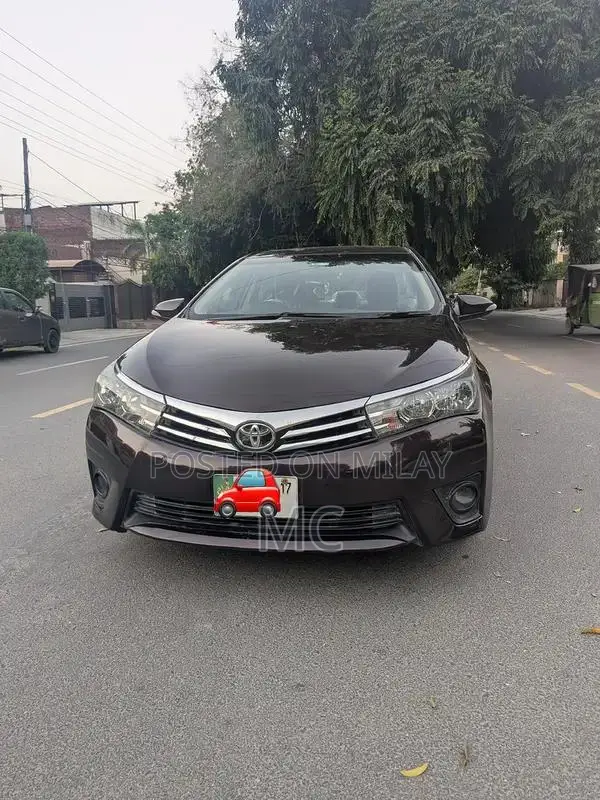 Toyota Corolla Altis Grande Sedan - Elegant Red Wine Luxury Model