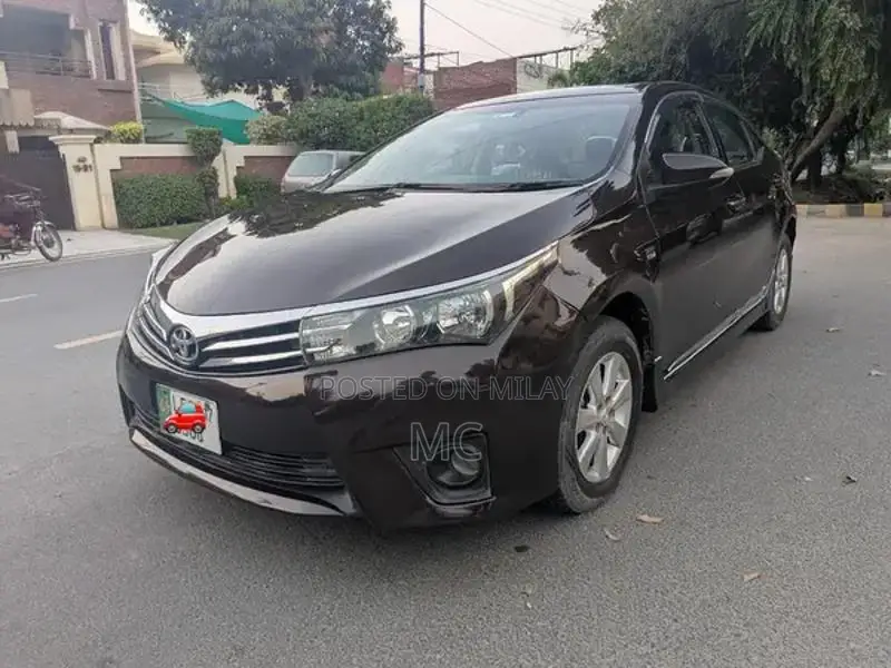 Toyota Corolla Altis Grande Sedan - Elegant Red Wine Luxury Model