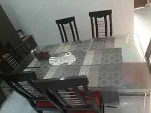 Photo - Glass Dining Table Set with Six Upholstered Chairs