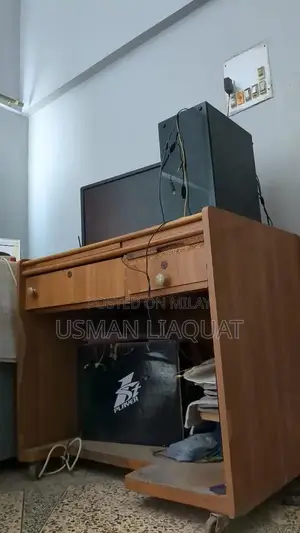 Photo - Mobile Computer Table with Wheeled Trolley Design