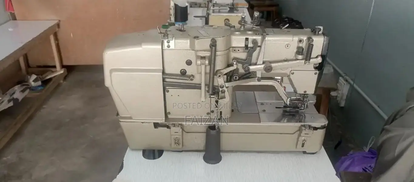 Overlocked Sewing Machine - Good Condition