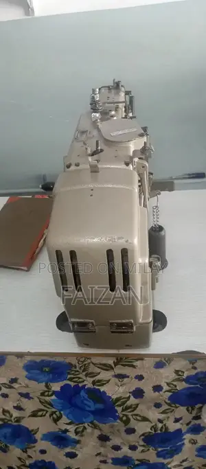 Overlocked Sewing Machine - Good Condition