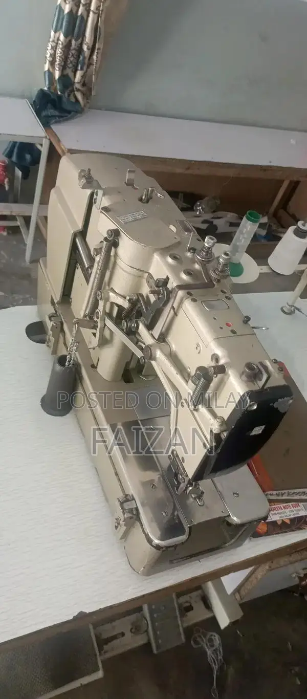 Overlocked Sewing Machine - Good Condition