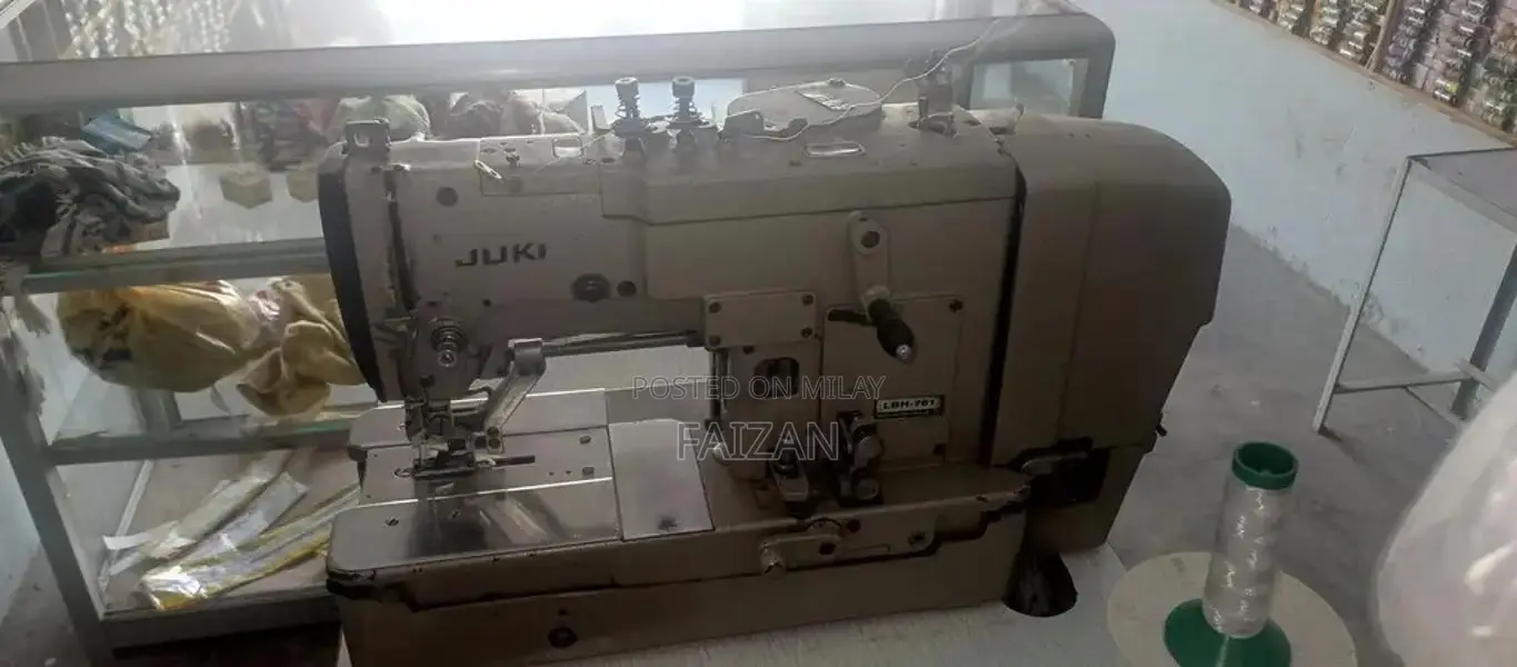 Overlocked Sewing Machine - Good Condition