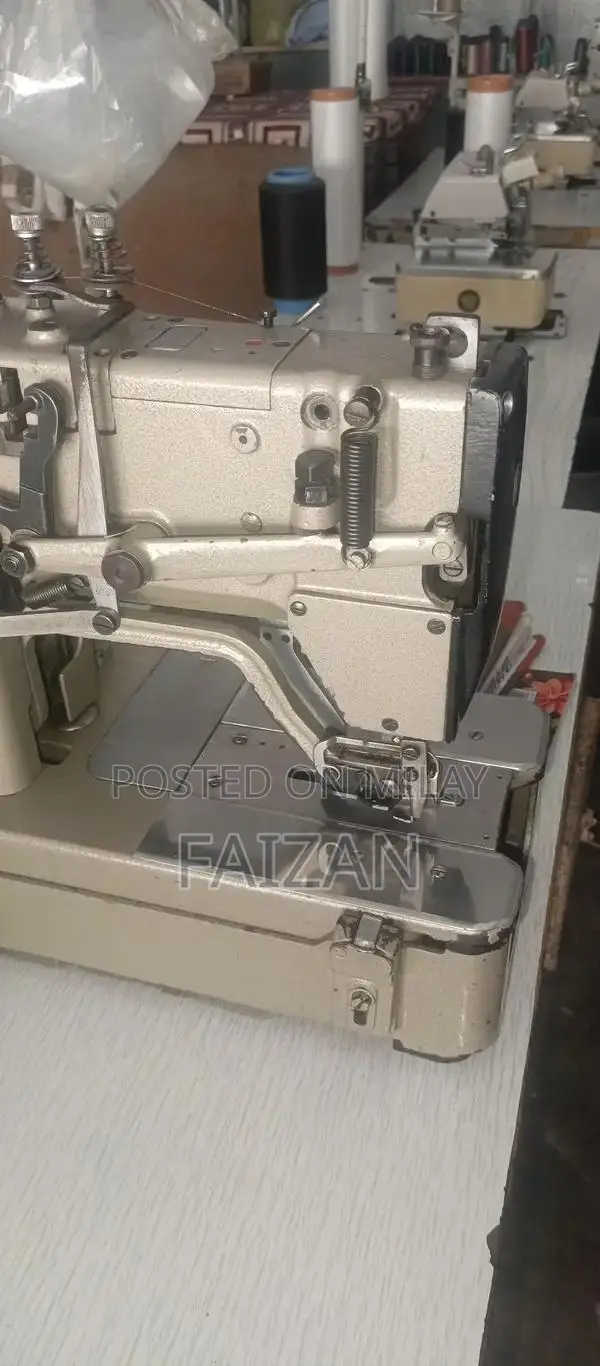 Overlocked Sewing Machine - Good Condition