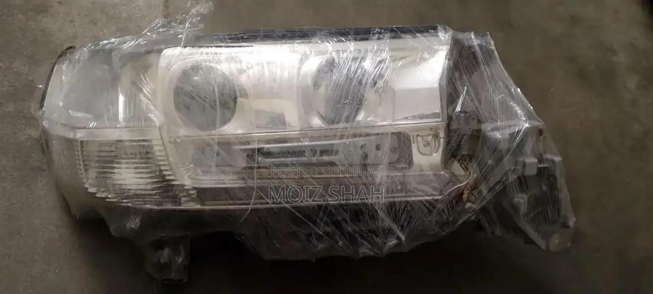 Toyota Land Cruiser V8 Genuine OEM Headlight Assembly