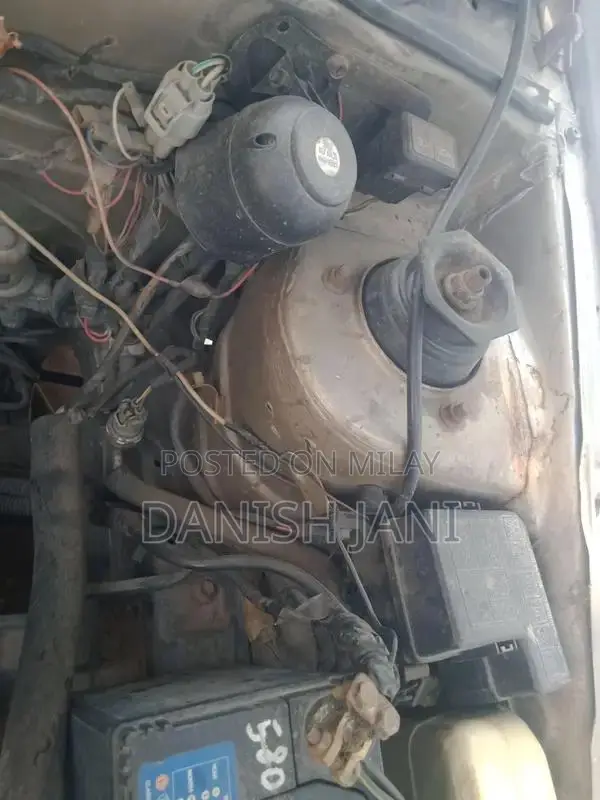 Two-Door Car with Air Conditioning and Suspension