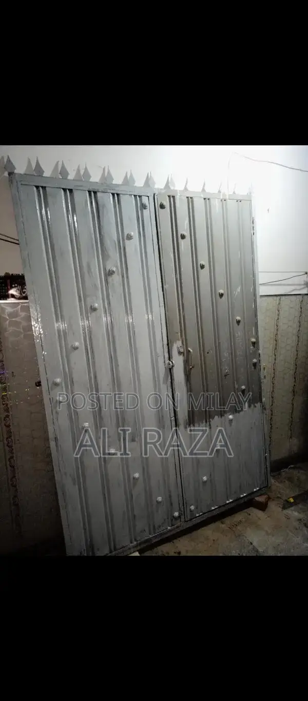 Heavy Metal Garden Gate with Window Design
