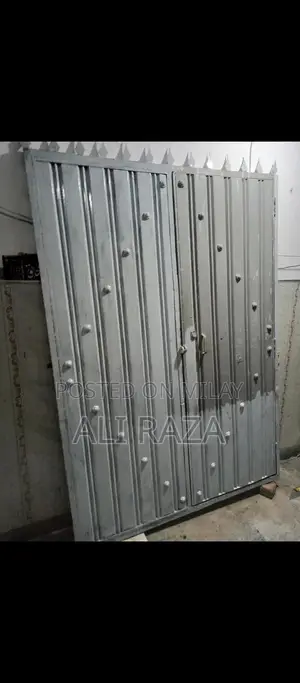 Heavy Metal Garden Gate with Window Design