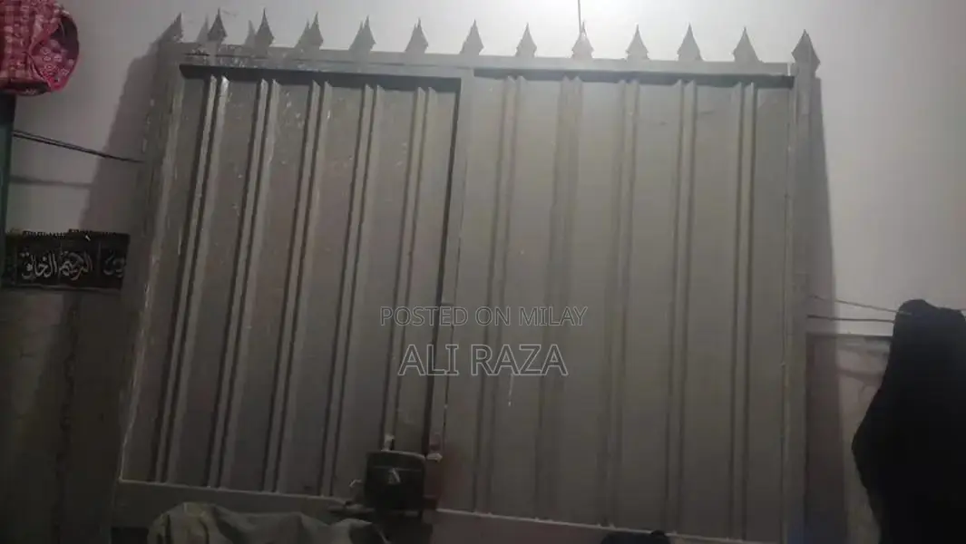 Heavy Metal Garden Gate with Window Design