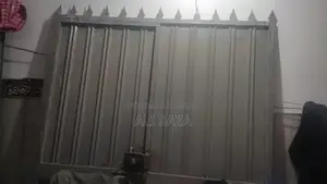 Heavy Metal Garden Gate with Window Design